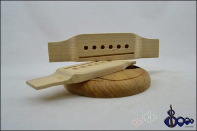 Western acoustic guitar bridge