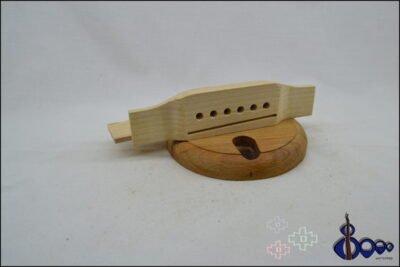 Western acoustic guitar bridge